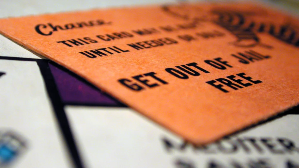A get out of jail free card in the board game Monopoly. Credit: Mark Strozier via Creative Commons.