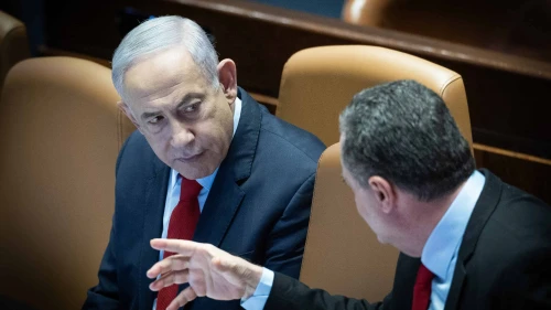 Prime Minister Benjamin Netanyahu speaks with then-Foreign Minister Israel Katz during a vote on the state budget at the Knesset in Jerusalem, March 13, 2024. Photo by Yonatan Sindel/Flash90.