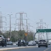 Vehicles drive along a highway on the outskirts of Kuwait City, July 8, 2026. Photo by AFP via Getty Images.
