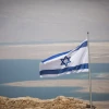 An Israeli flag on Masada, near the Dead Sea in southern Israel, on July 19, 2018. Photo by Yonatan Sindel/Flash90.