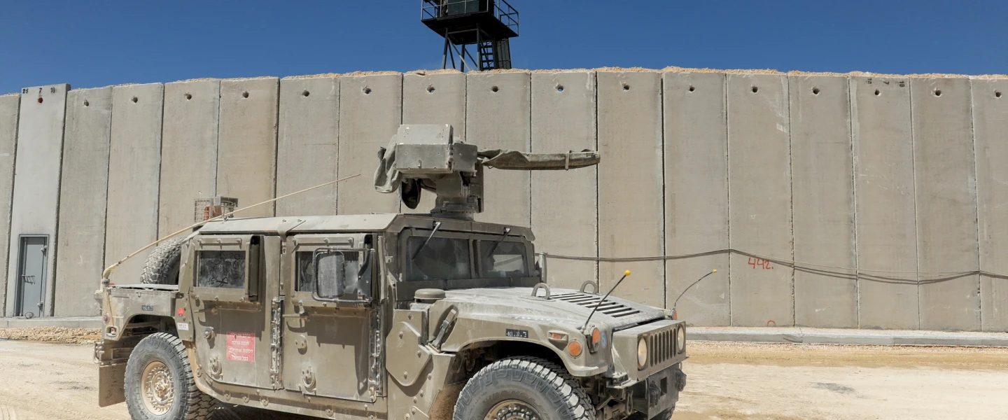 An Israeli army Humvee drives near a new concrete wall near Rosh Hanikra on the Lebanese border, Sept. 5, 2018. Photo by Basel Awidat/Flash90.