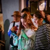 Chen Goldstein-Almog and her daughter Agam light Chanukah candles together with other members of Kibbutz Kfar Aza in Shefayim, Dec. 10, 2023. Photo by Avshalom Sassoni/Flash90.