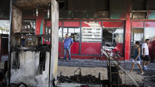 Click photo to download. The scene of a gas station in Ashdod that was hit directly by rocket fire from Gaza on the fourth day of Operation Protective Edge, July 11, 2014. Credit: Hadas Parush/Flash90.