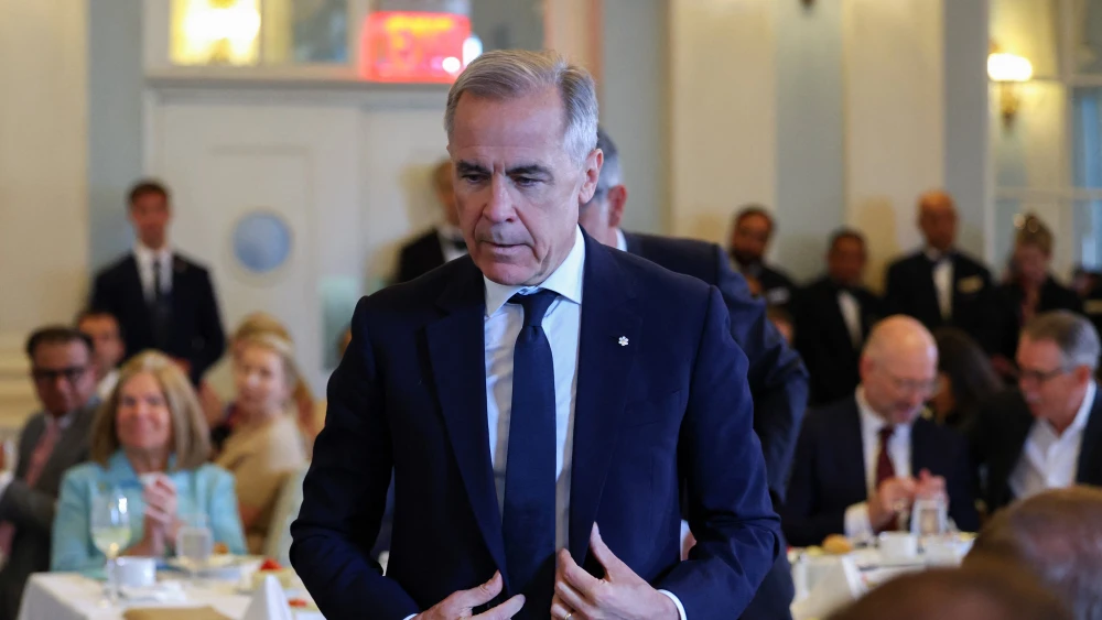 Canadian Prime Minister Mark Carney approaches the podium before speaking at the Economic Club in New York on May 28, 2026. Photo by Angela Weiss/AFP via Getty Images.