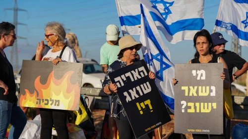 Demonstrators protest against the Israeli government at the Amiad Junction, north of the Sea of Galilee, July 6, 2024. Photo by Ayal Margolin/Flash90.