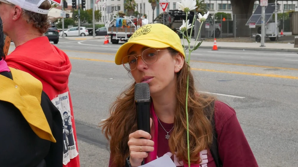 Ziegler student Lily Gross leads a Tisha B’Av rally