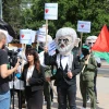 Israel Defense Forces reservists protest outside the U.N. Human Rights Council in Geneva, costumed as terrorists to “thank” the council for its anti-Israel bias in a demonstration organized by the Tel Aviv-based Shurat HaDin Law Center on June 7, 2022. Credit: Courtesy.