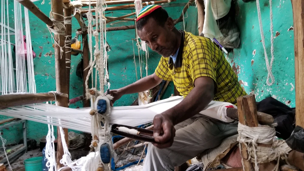 Making tallitot. Credit: The Heart of Israel.