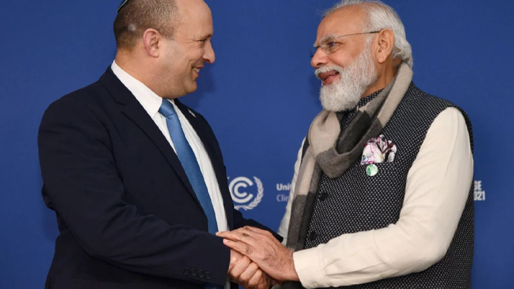 Israeli Prime Minister Naftali Bennett meets with Indian Prime Minister Narendra Modi at the U.N. Climate Change Conference in Glasgow, Scotland, on Nov. 2, 2021. Credit: GPO/Haim Zach,