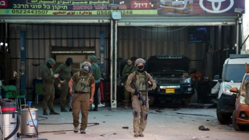 Israeli security forces secure the scene of a shooting attack in Hawara, in Samaria, near Nablus, Aug. 19, 2023. Photo by Flash90.