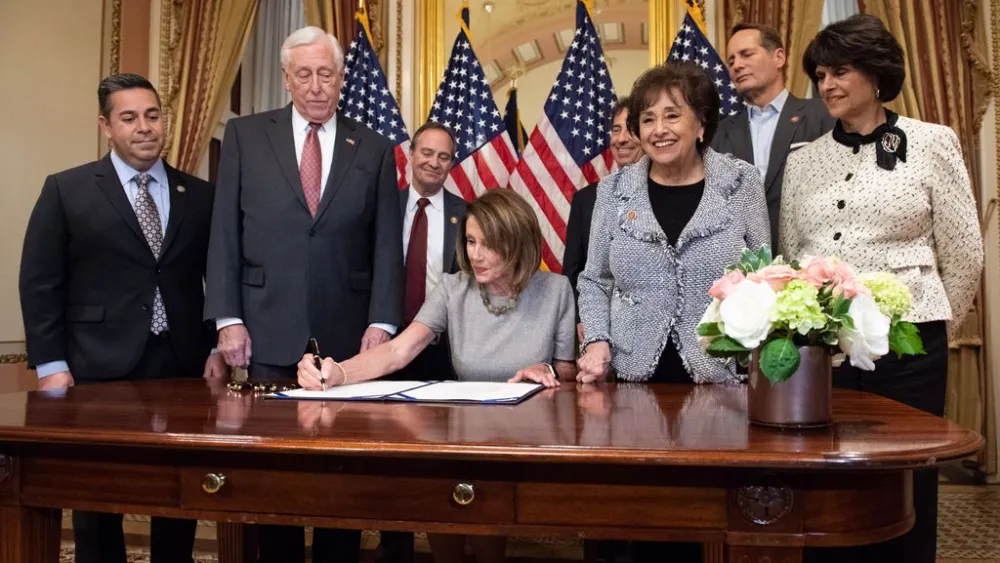 Speaker of the House Nancy Pelosi signs a bill along with Democratic House leadership on Jan. 25, 2019. Credit: Nancy Pelosi via Twitter.