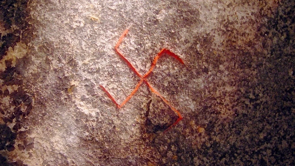A photograph of the swastika on the Snoldelev stone in the National Museum in Copenhagen, Denmark. Credit: Wikimedia Commons.