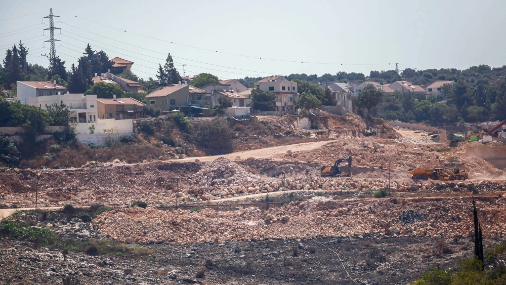 Construction work on new housing in the Jewish community of Kiryat Netafim, south of the Samaria city of Nablus, July 20, 2022. Photo by Nasser Ishtayeh/Flash90.