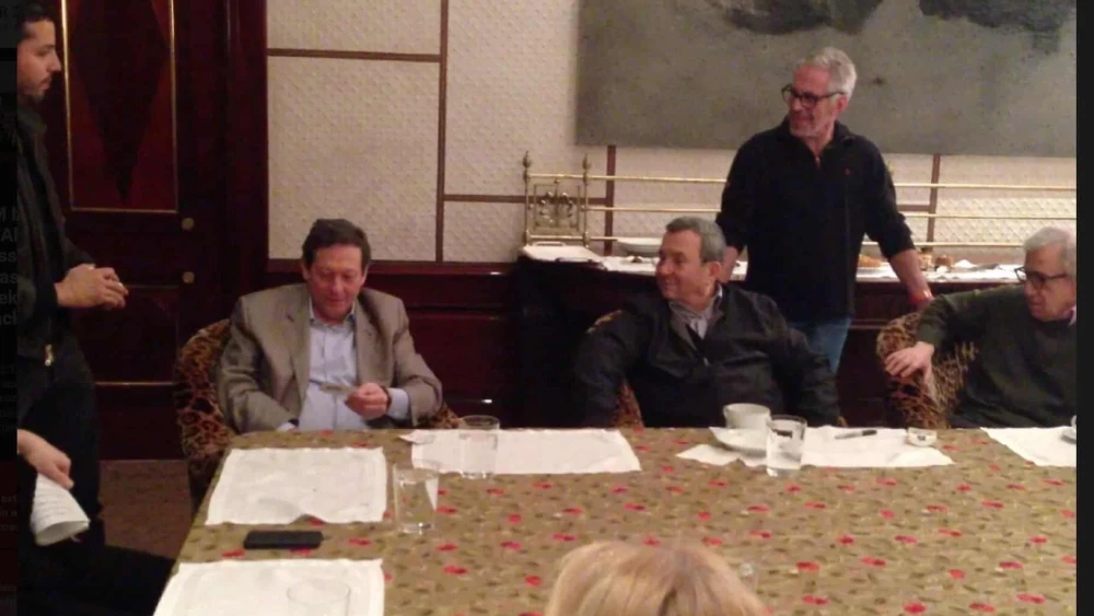 From left, seated: billionaire Thomas Pritzker, former Israeli Prime Minister Ehud Barak and filmmaker Woody Allen; magician David Blaine stands at left, while the late financier Jeffrey Epstein stands between Barak and Allen, in an undated photo from Epstein’s estate released on Dec. 18, 2025. Source: House Oversight Democrats.