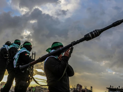 Members of Hamas’s Al-Qassam Brigades waiting for the handover of the bodies of four Israeli hostages to the Red Cross in Khan Yunis, the southern Gaza Strip, on Feb. 20, 2025. Photo by Abed Rahim Khatib/Flash90.