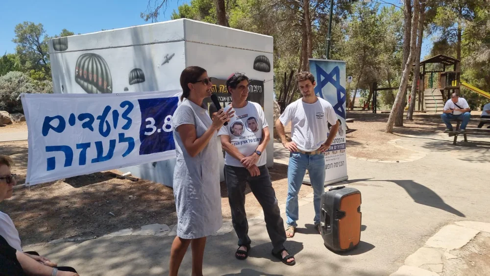 The family of Lt. Hadar Goldin, whose body has been held captive by Hamas in Gaza since 2014, address supporters during a protest march to the Gaza border, July 29, 2022. Source: Twitter.