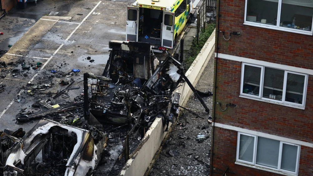 Burnt-out ambulances are pictured in a parking area along a street in the Golders Green neighborhood of North London, March 23, 2026. Photo by Henry Nicholls/AFP via Getty Images.