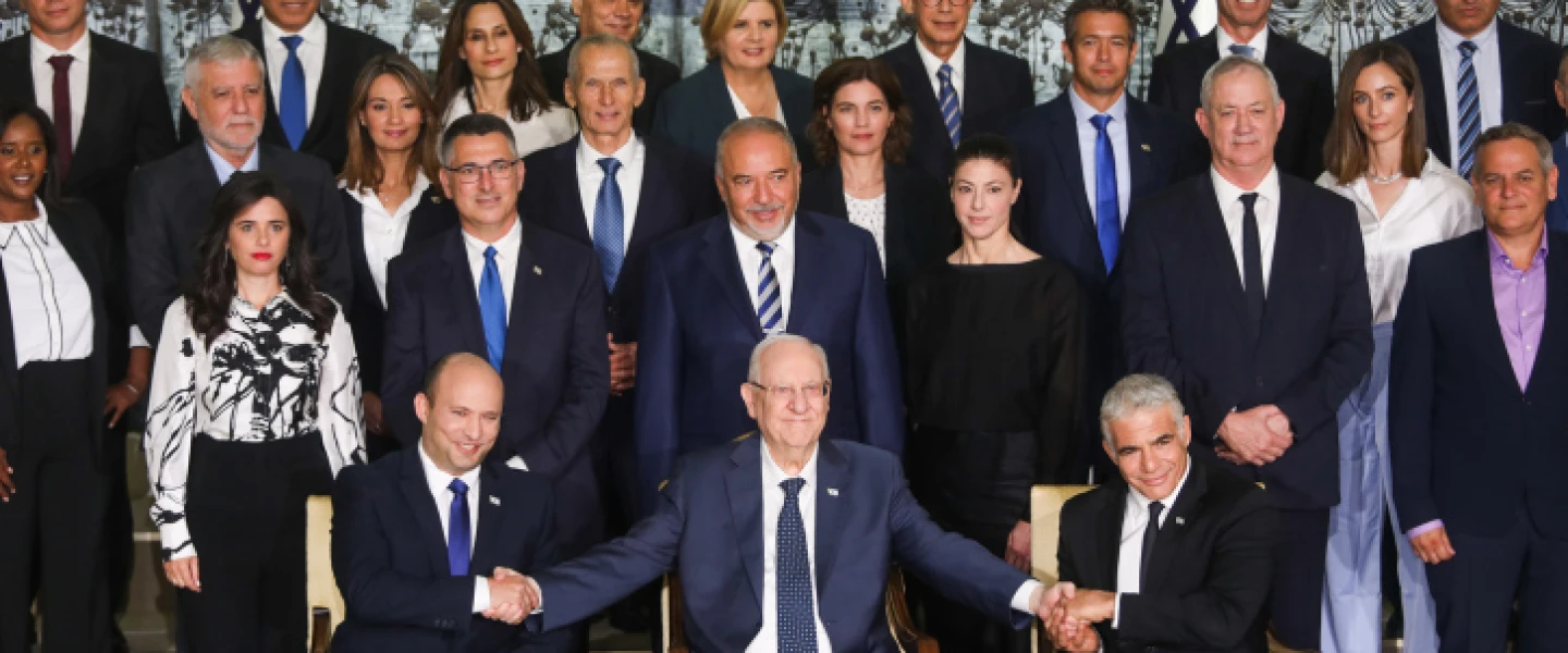 Israeli Prime Minister Naftali Bennett, Foreign Minister Yair Lapid, President Reuven Rivlin and other ministers pose for a group photo of the country’s 36th government, at the President's Residence in Jerusalem, June 14, 2021. Photo by Yonatan Sindel/Flash90.