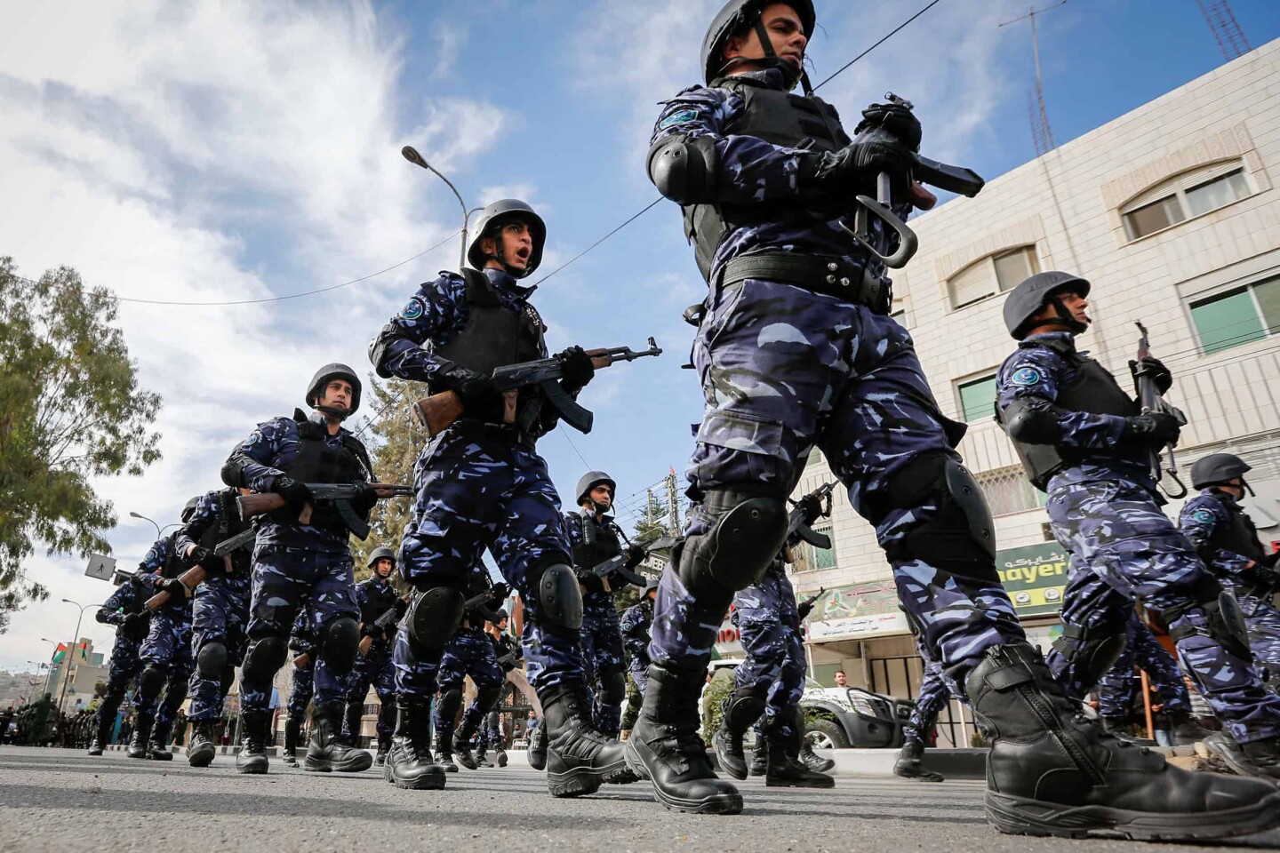 Palestinian Authority security personnel parade in the Judea city of Hebron, Nov. 14, 2017. Photo by Wisam Hashlamoun/Flash90.