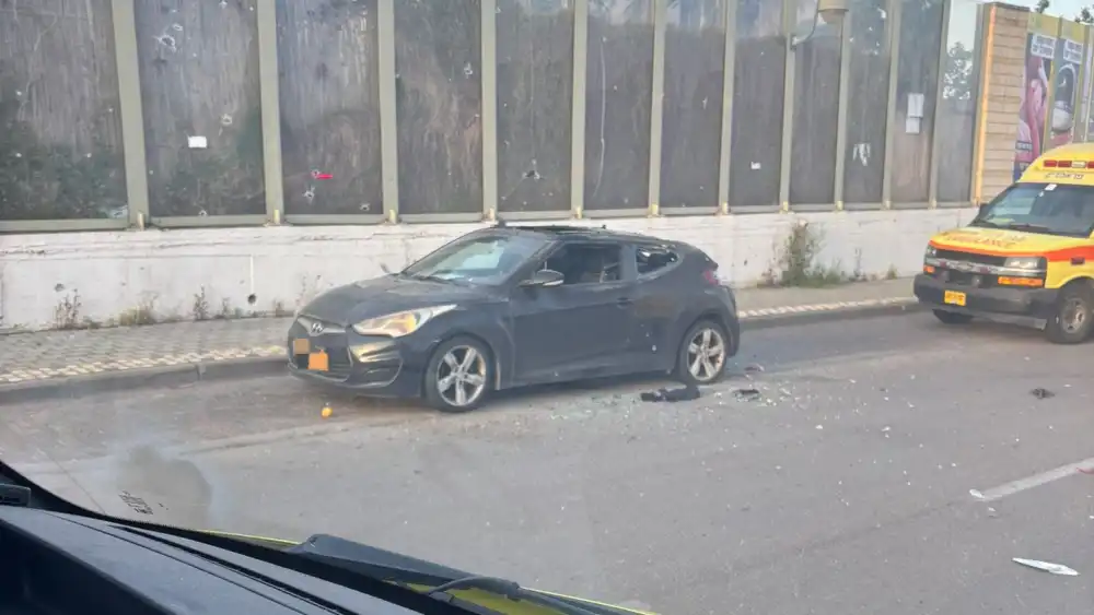 Israeli first responders at the site where an Iranian munition hit in the central Israeli vehicle of Petach Tikvah, April 6, 2026. Credit: Magen David Adom.