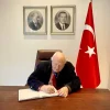 Miguel Moratinos, the U.N. high representative for the Alliance of Civilizations, signs the condolences book at the Turkish Mission to the U.N., Feb. 11, 2023. Credit: Turkish Mission to the UN and Turkish MFA.