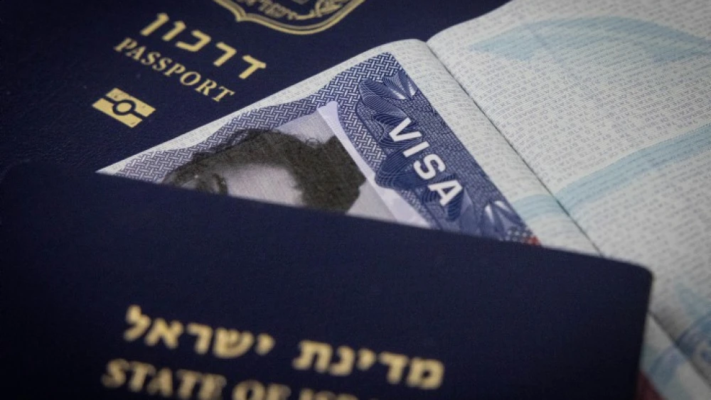 Illustration of passports and a travel visa. Sept. 23, 2023. Photo by Chaim Goldberg/Flash90.