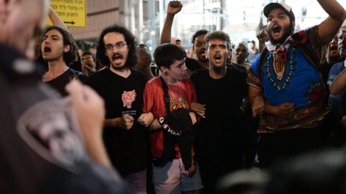 Ethiopian Israelis and supporters take part in a protest in Tel Aviv against the use of police violence after the shooting of Ethiopian teenager Solomon Tekah on July 3, 2019. Photo by Tomer Neuberg/Flash90.