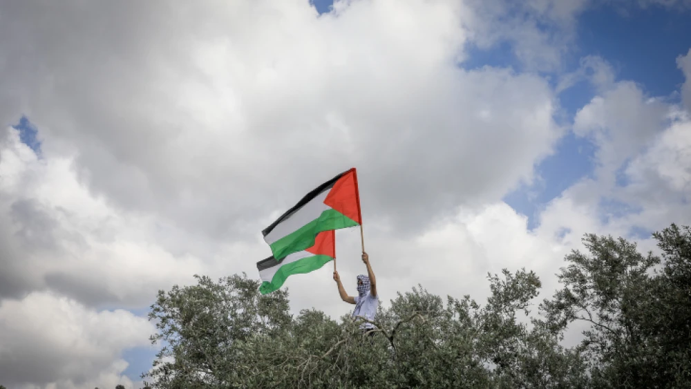 Israeli Arabs and left-wing activists take part in a rally marking the 74th anniversary of "nakba," the term used to mark the events leading to Israel's founding in 1948, near Sakhnin in northern Israel on April 5, 2022. Photo by Jamal Awad/Flash90.