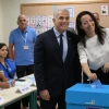 Israeli Prime Minister Yair Lapid and his wife Lihi vote in Israel's national election, Nov. 1, 2022. Credit: Amos Ben Gershom/GPO.