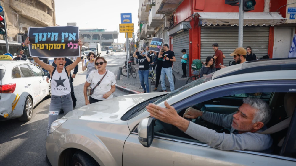 Israelis protest against the Israeli government's planned judicial overhaul, in South Tel Aviv, March 1, 2023. Photo by Erik Marmor/Flash90.