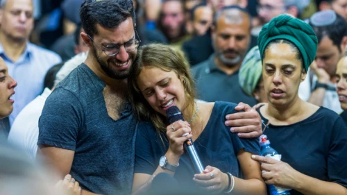 Friends and family attend the funeral in Moshav Yesodot of 21-year-old Harel Masood, who was killed in a terror attack near the near the Jewish community of Eli, June 20, 2023. Photo by Liron Moldovan/Flash90.