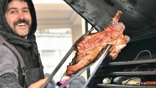 Ari White, the founder of the Wandering Que and organizer of Kiddishfest 2022, says his smoker gives the meat a special taste. Photo by Sharon Kessel.