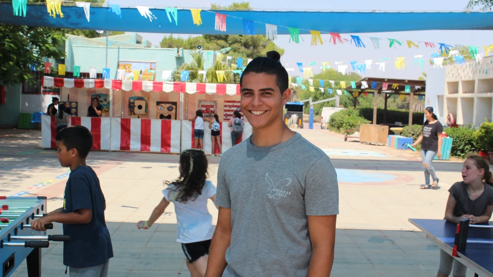 Adam Russell, a counselor at Yuvalei Ha-Bsor School’s summer camp in Israel’s Eshkol Region. Photo by Eric Narrow/JNF.