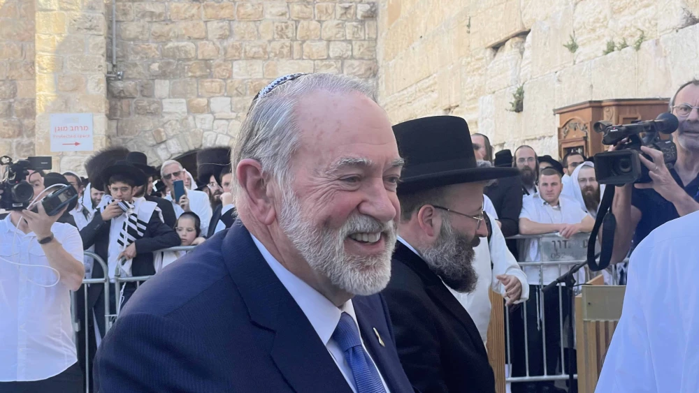 U.S. Ambassador to Israel Mike Huckabee and Rabbi Shmuel Rabinowitz, rabbi of the Western Wall, at the holy site in Jerusalem, April 18, 2025. Credit: Western Wall Heritage Foundation.