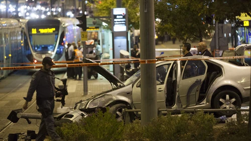 The scene of a car crashing into Jerusalem's Ammunition Hill light-rail station in a Palestinian terrorist attack on Oct. 22, 2014. Photo by Flash90.