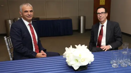 Israeli Finance Minister Moshe Kahlon (left) with U.S. Treasury Secretary Steven Mnuchin in Washington, D.C., on Dec. 4, 2018. Credit: Moshe Kahlon/Twitter.