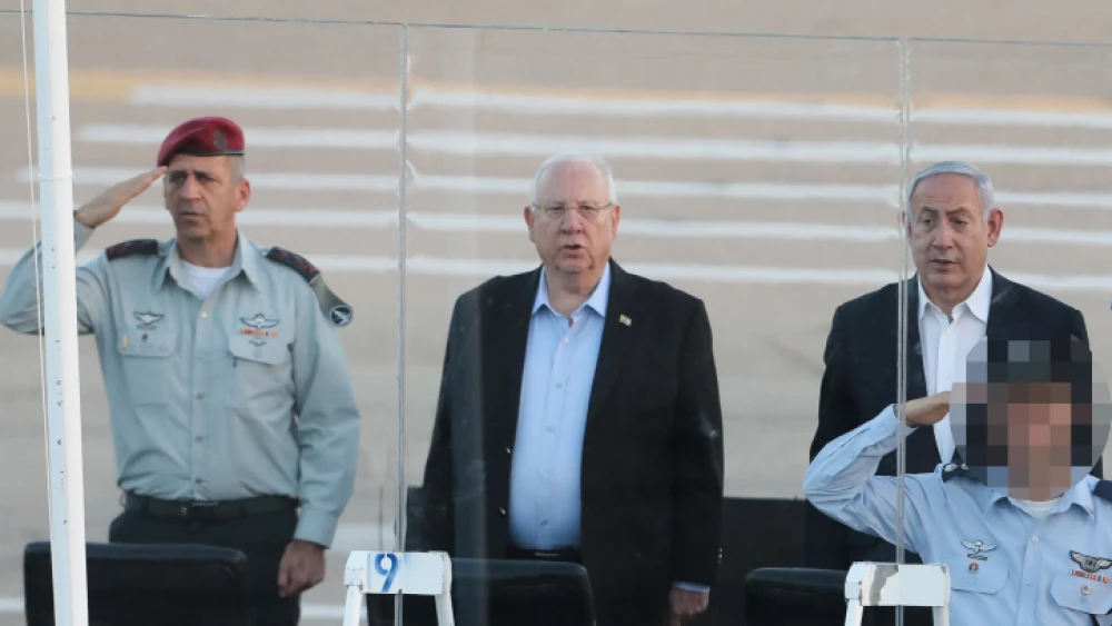 Israel Defense Forces' Chief of Staff Aviv Kochavi (left), Israeli President Reuven Rivlin (center) and Israeli Prime Minister Benjamin Netanyahu at a graduation ceremony for soldiers who have completed the IAF Flight Course at the Hatzerim Air Base, June 27, 2019. Photo by Flash90.
