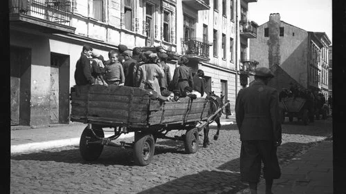 Children are transported from the Lodz Ghetto to the Nazi concentration camp of Chelmno in 1942, in one of the photos on display as part of the “Memory Unearthed: The Lodz Ghetto Photographs of Henryk Ross” exhibit. Credit: Courtesy Museum of Fine Arts, Boston.