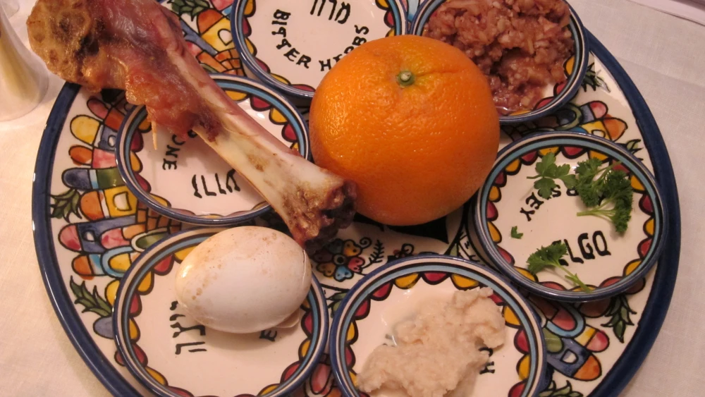 A Passover seder plate featuring an orange, which was added several years ago by some as a symbol of women’s rights or to represent the gay and lesbian community.