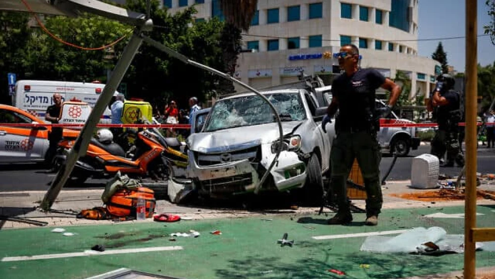 The scene of a Palestinian terrorist attack that wounded seven people on Pinchas Rosen Street in Tel Aviv's Ramat Hahayal neighborhood, July 4, 2023. Photo by Miriam Alster/Flash90.