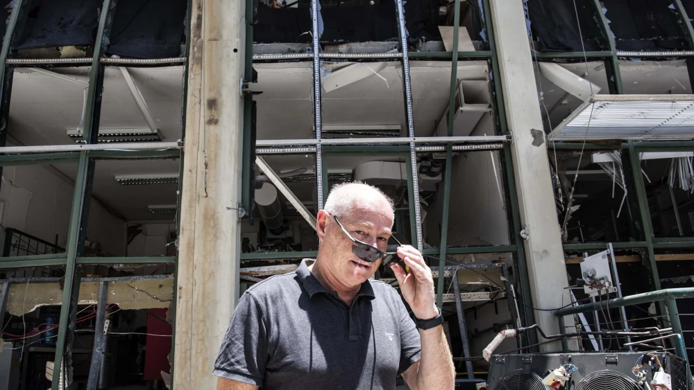 Professor Yinon Rudich surveys the damage from the Iranian missile that destroyed his four laboratories at the Weizmann Institute of Science in Rehovot, July 10, 2025. Photo by Rina Castelnuovo.