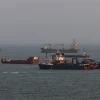 Ships are anchored in the Strait of Hormuz on Aug. 10, 2026 off the coast of Bandar Abbas, Iran. Photo by Ali Saeedi/Getty Images.