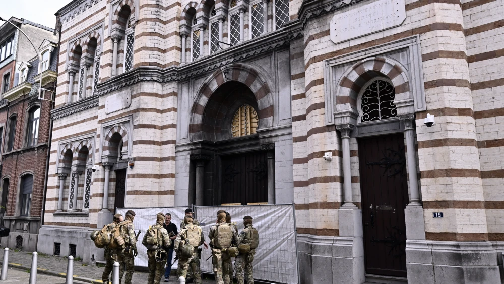 Soldiers stationed in front of a synagogue in Liege, Belgium, on April 10, 2026. Photo by Eric Lalmand/BELGA MAG/Belga/AFP via Getty Images.