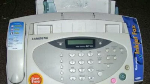 An old-school fax machine from the 1990s. Source: Wikpedia.