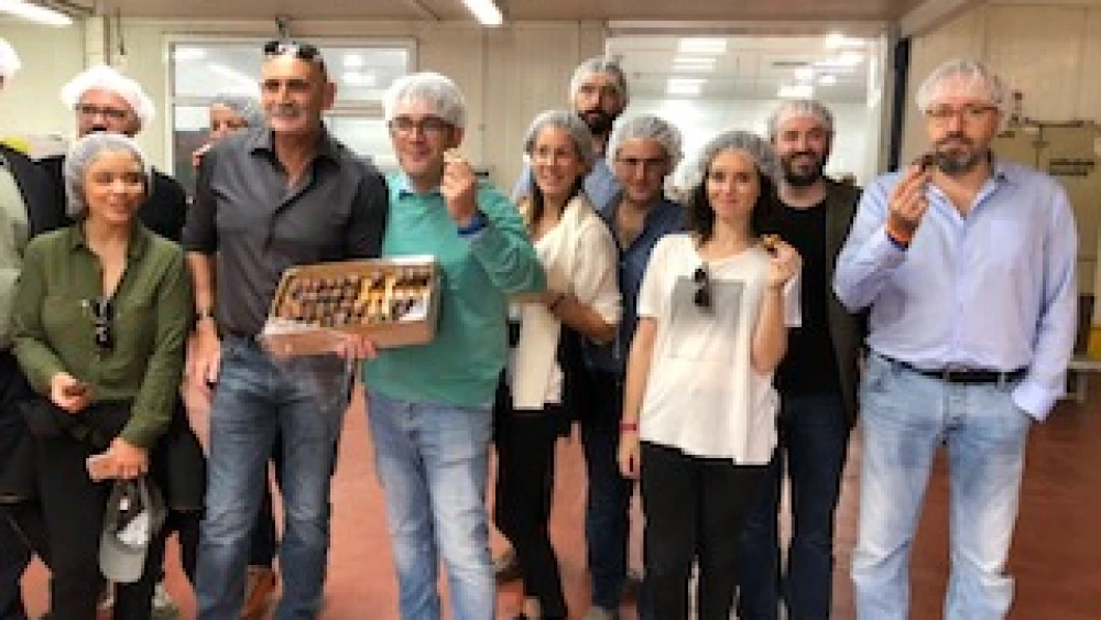 The group in a date factory in the Jordan valley. Courtesy.