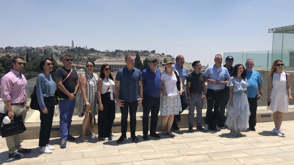 Ambassadors from several nations pose at the Aish HaTorah Center in the Old City of Jerusalem overlooking the Western Wall. Photo by Josh Hasten.