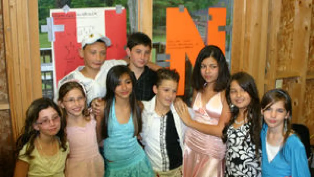 Nine children from the southern Israeli city of Sderot spent three weeks in 2007 at Camp Sunapee in Georges Mills, N.H. Credit: Courtesy of Diana Burmistrovich.