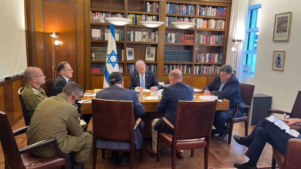 Israeli Prime Minister Benjamin Netanyahu, flanked by advisers, speaks to U.S. President Joe Biden on the phone. Oct. 9, 2024. Credit: Prime Minister's Spokesman's Office.