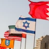 The flags of the United States, the United Arab Emirates, Israel and Bahrain on the side of a road in Netanya on Sept. 14, 2020. Photo by Flash90.