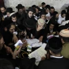 Jewish men pray at Joseph’s Tomb in Shechem/Nablus on July 4, 2011. Believed to be the final resting place of the biblical patriach Joseph, the area continually draws worshippers, who are often met by violence. Photo by Yaakov Naumi/Flash90.